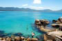 Barra da lagoa, piscinas naturais e diversas pessoas mergulhando e se divertindo neste para&iacute;so das praias de santa catarina