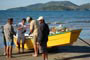 Praia do perequ&ecirc; em porto belo, pescadores se preparando para ir em busca da tainha.