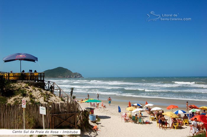 Canto sul da praia do rosa, pessoas tomando sol