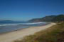 praia dos açores sc, mar calmo, águas limpas e restinga preservada