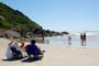 siriu garopaba, casal tomando um sol a beira mar