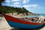 Praia de ganchos de fora, barco parado na areia